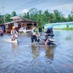 Jalan Trans Sulawesi Dikepung Banjir, Satlantas Polres Morut Himbau Warga Untuk Batasi Keluar Rumah