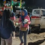 Relawan Potoutusan Bagi-bagi Snack dan Air Mineral Ke Penonton Konser Deklarasi Pasangan BERANI di Luwuk Banggai